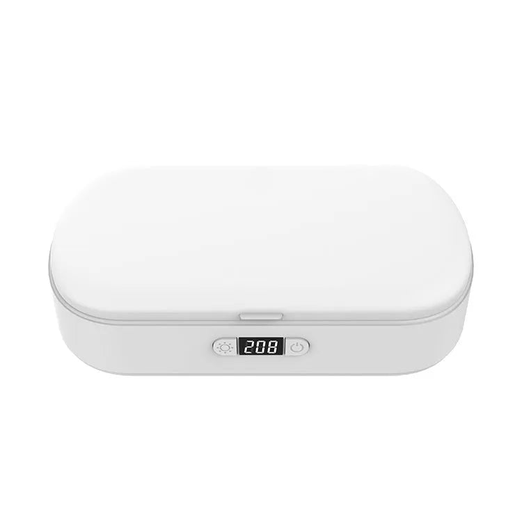 White UV steriliser and wireless charging box for mobile phones and small items