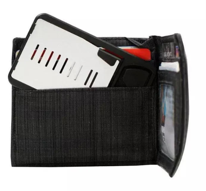 Black desktop card phone holder on a wooden desk next to a mobile phone and credit cards