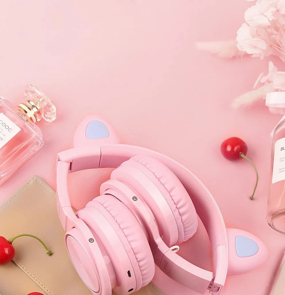 Luminous Bluetooth wireless headphones in pink white colour with high imitation protein earmuffs and braided cable