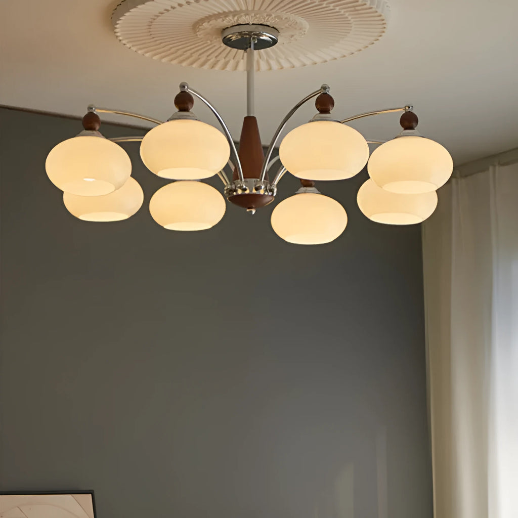 Persimmon glass and chrome chandelier with multiple glass lampshades in a choice of colours.