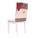 Set of Christmas chair covers featuring Santa Claus, Snowman and Santa hat designs on dining chairs