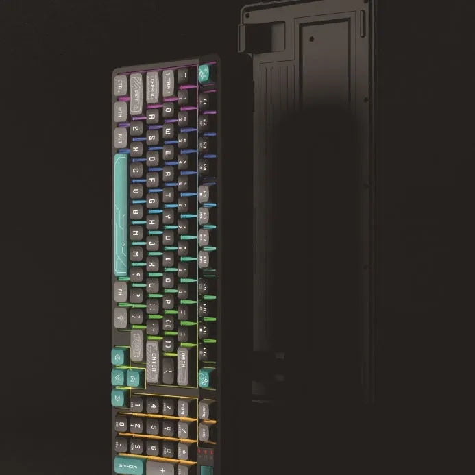 USB gaming keyboard with multi-colour backlight in a compact black and green design on a desktop