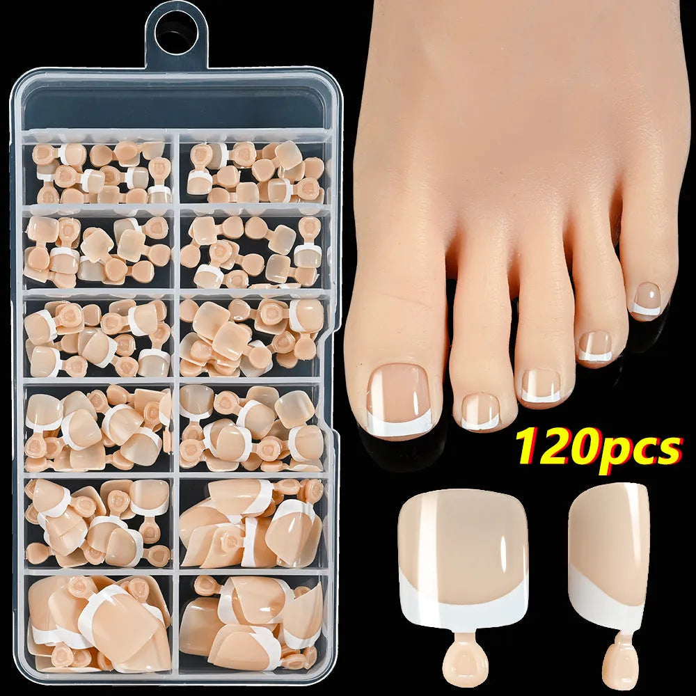 Open box showing 120 French white edge nude square false toe nail pieces in various shades.