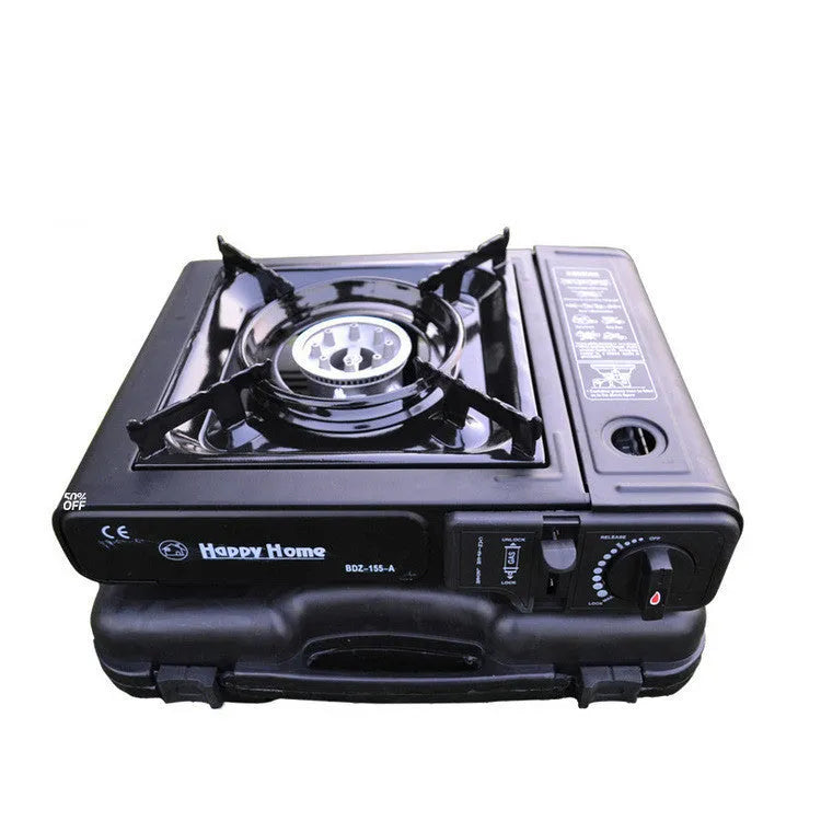 Black portable cassette stove with electronic ignition, 340x280x115mm, shown with black plastic box for camping and BBQ use