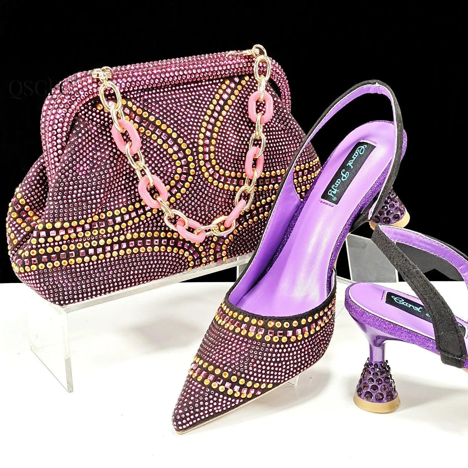 Women's pointed toe high heel shoes with matching small bag in synthetic leather, wine glass heel.
