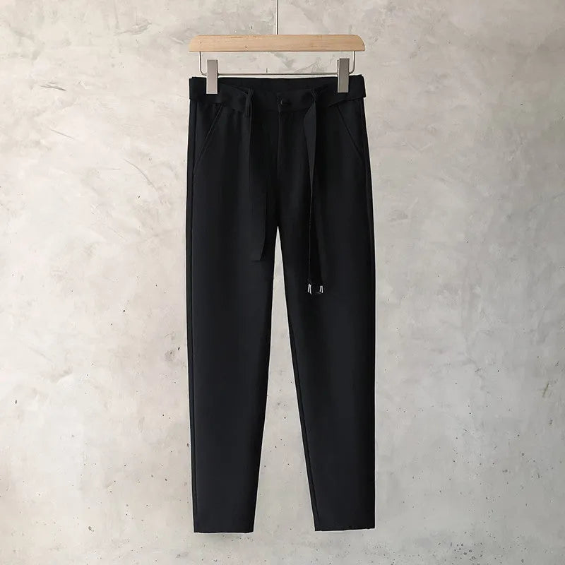 Boys slim straight wool trousers with tapered fit and belt loops in business casual styling