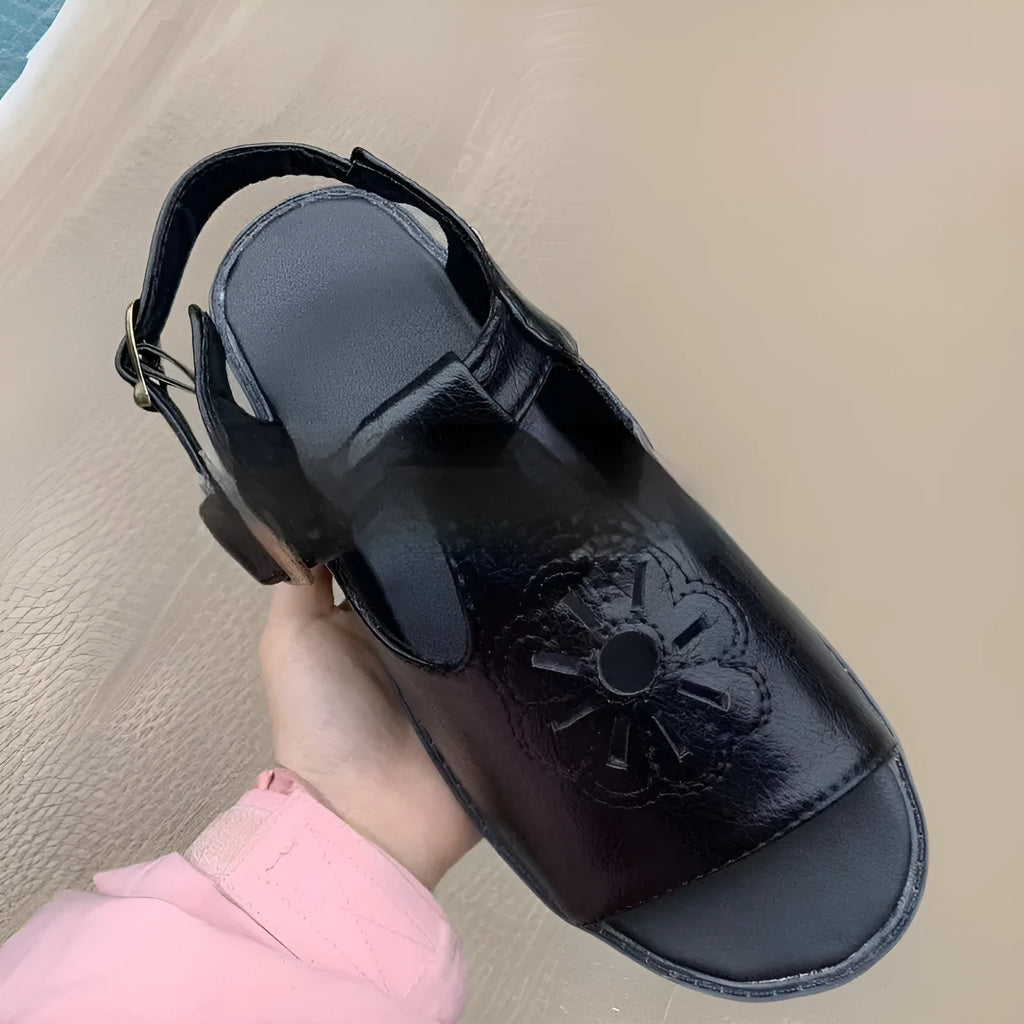 Men's black embroidered floral beach sandals with flat heel and PU upper.