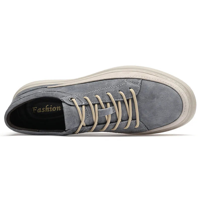 Men's grey casual leather skate shoes with low-top design and round toe on a rubber sole.