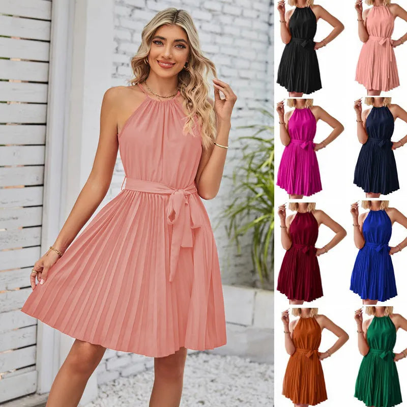 Women's black halter neck strapless sundress with a pleated chiffon skirt and an adjustable waist belt.
