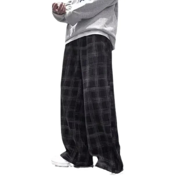 Men's black and green plaid loose fit straight leg trousers with mid waist design