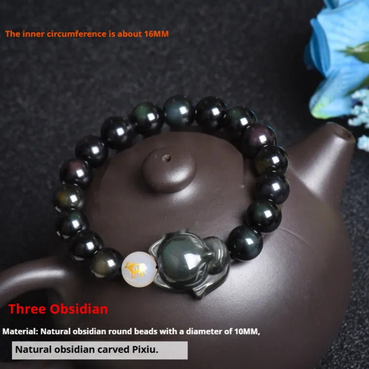 Natural obsidian bracelet with zodiac charm in gold, silver, or black stone styles.