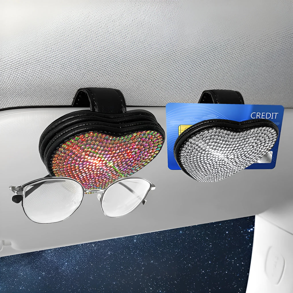 Black PU leather magnetic storage clip with diamond encrustment, shown attached to a car sun visor.