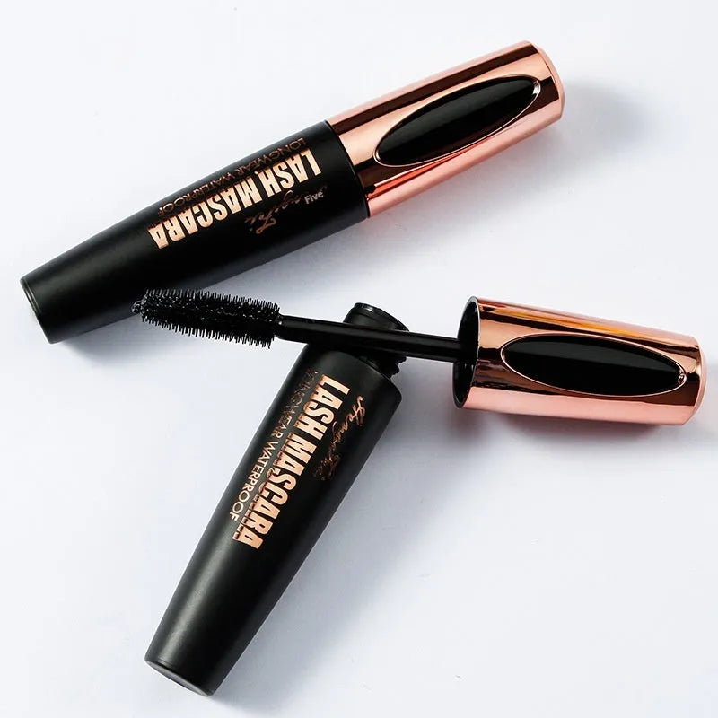 Black waterproof mascara tube creating thick, long curled lashes with sweat and smudge resistance