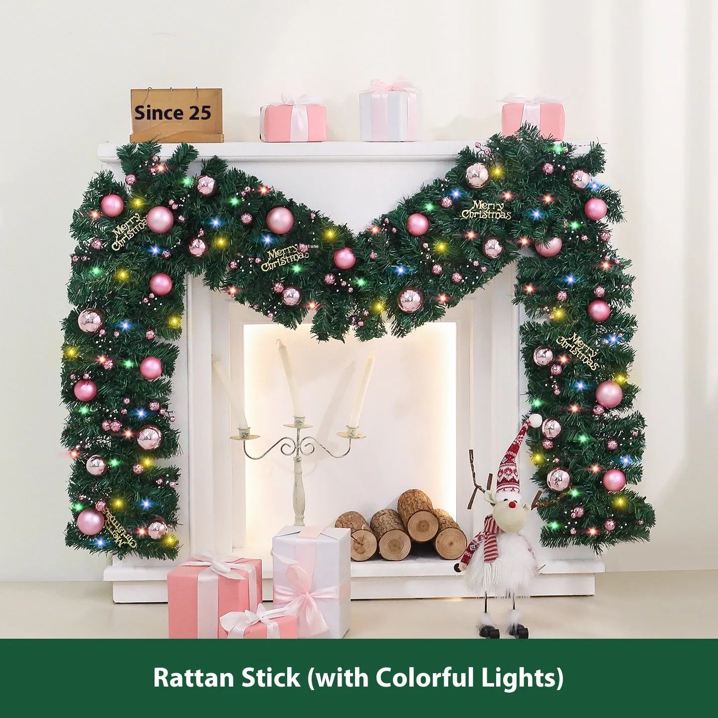 2.7 metre long pink Christmas rattan decoration with 240 decorative heads draped on a mantelpiece