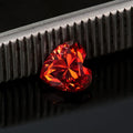 Heart-shaped moissanite gemstone in lemon yellow colour showing six size options