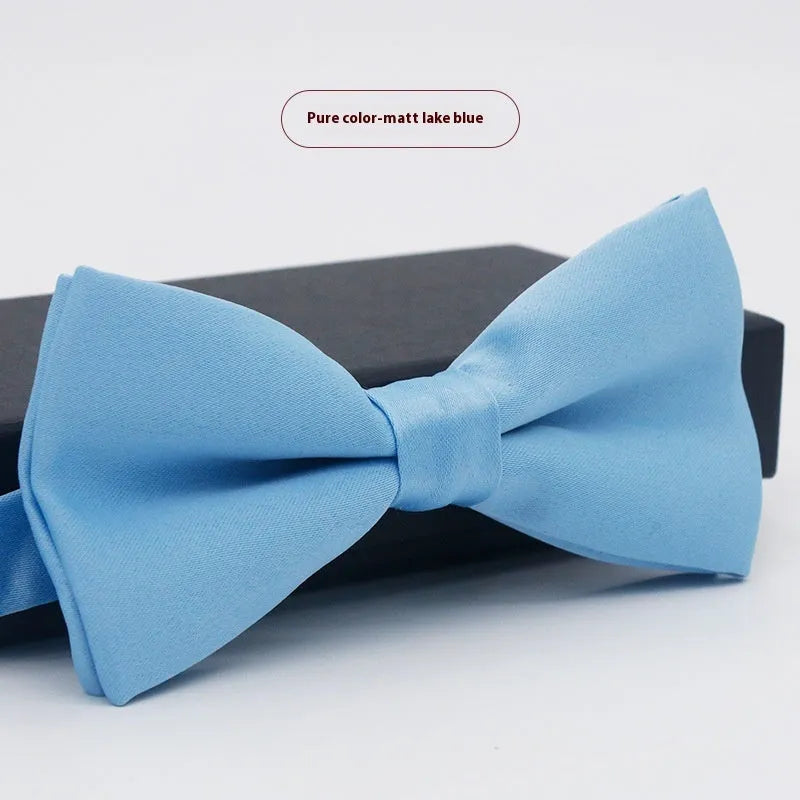 Men's solid colour flat head polyester bow tie on white background