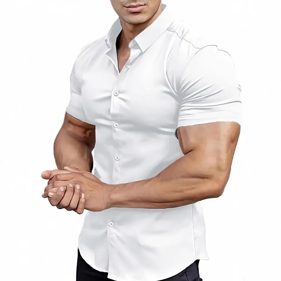 Man wearing a brown short sleeve printed casual shirt with a collar.