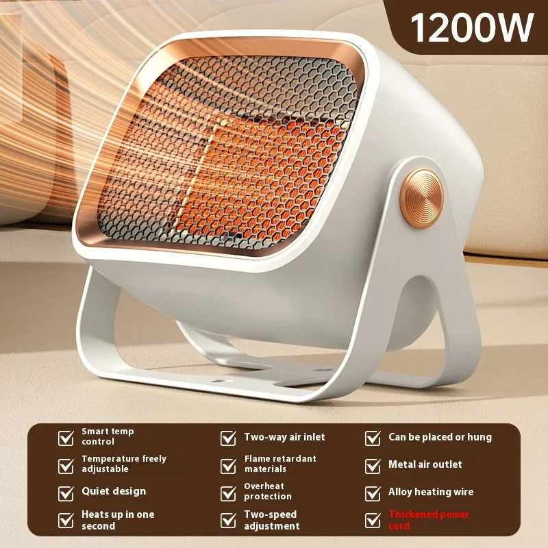 Compact white PTC ceramic desktop electric heater on a wooden desk.