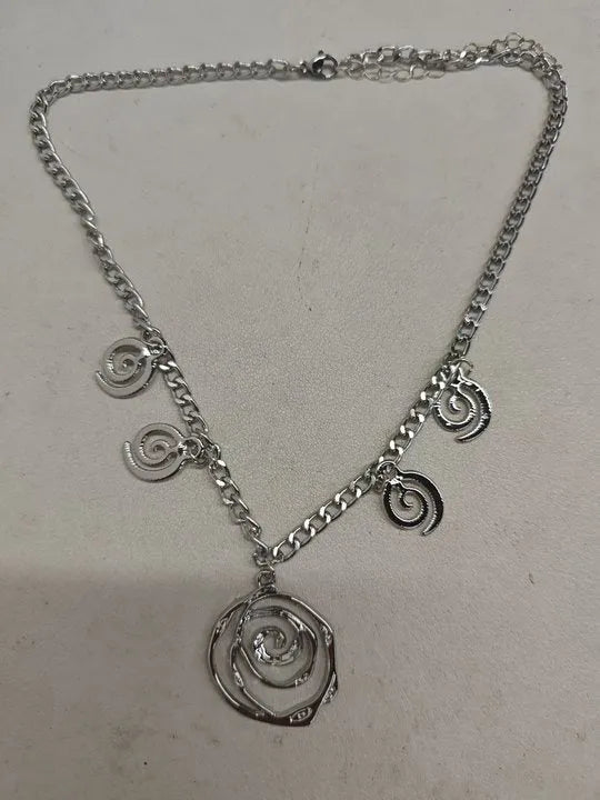 Spiral donut geometric jewellery set with necklace, bracelet, and earrings in gold electroplate