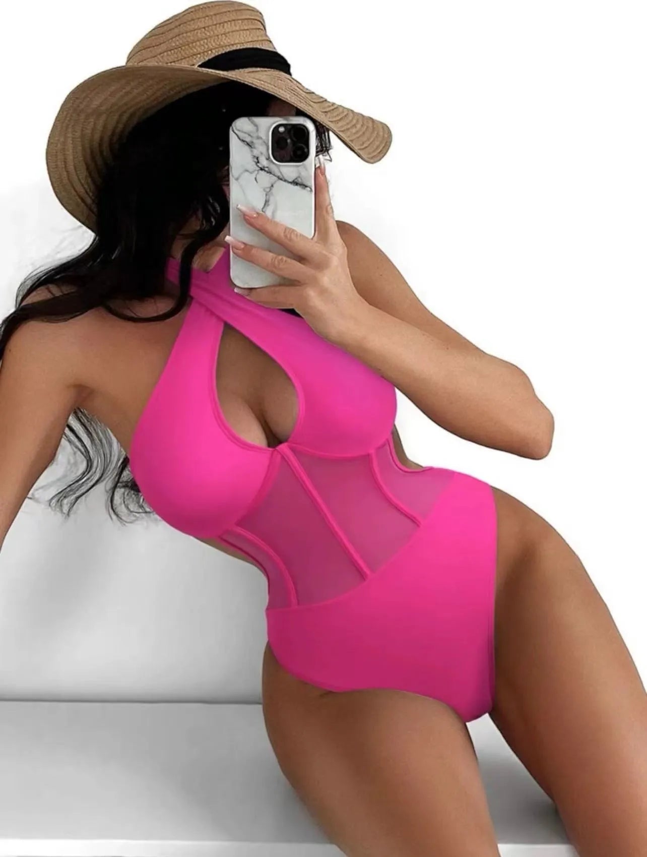 Women's black one-piece swimsuit bikini made of nylon and spandex fabric on a neutral background.