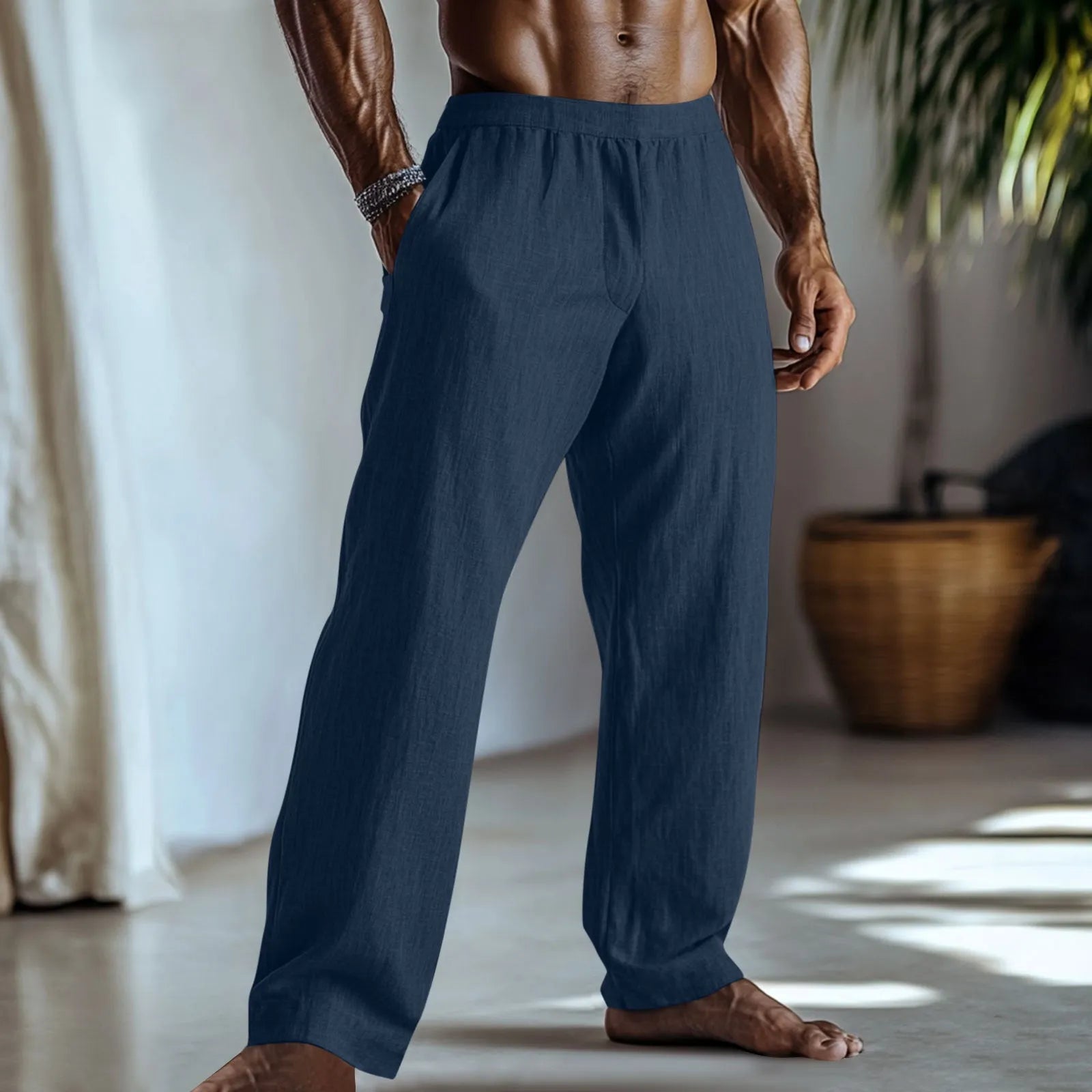 Straight-leg cotton and linen trousers in British casual style with front pockets.