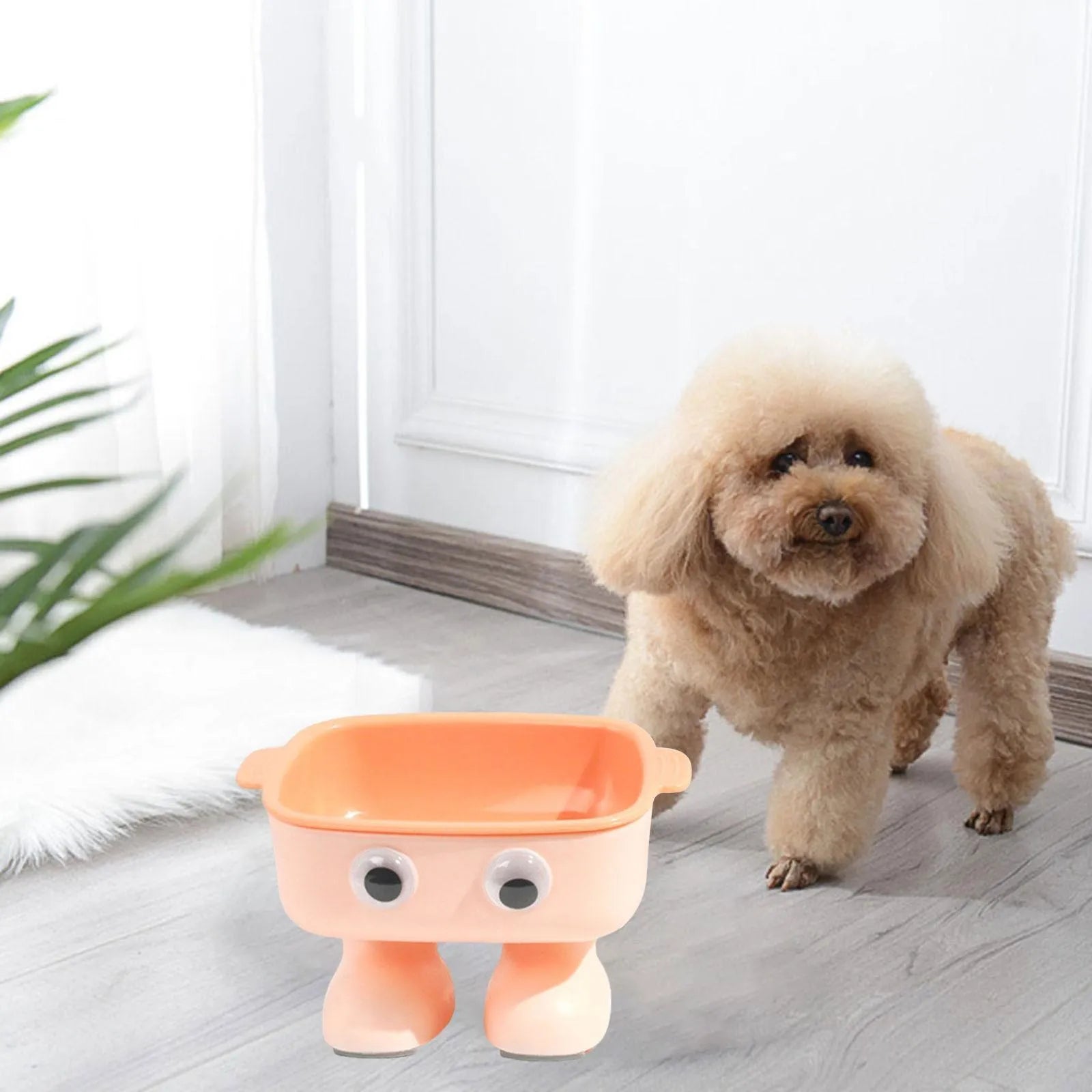 Elevated cat bowl with robot shape, 15° tilt angle, and anti-slip base for pet feeding