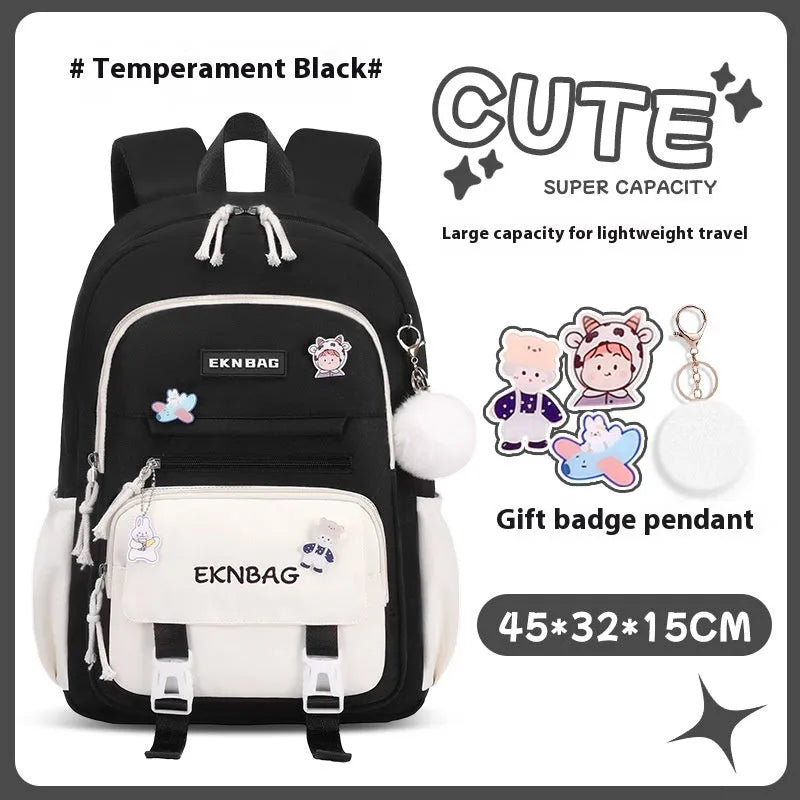 Pink waterproof Oxford cloth school backpack for girls with curved shoulder straps.