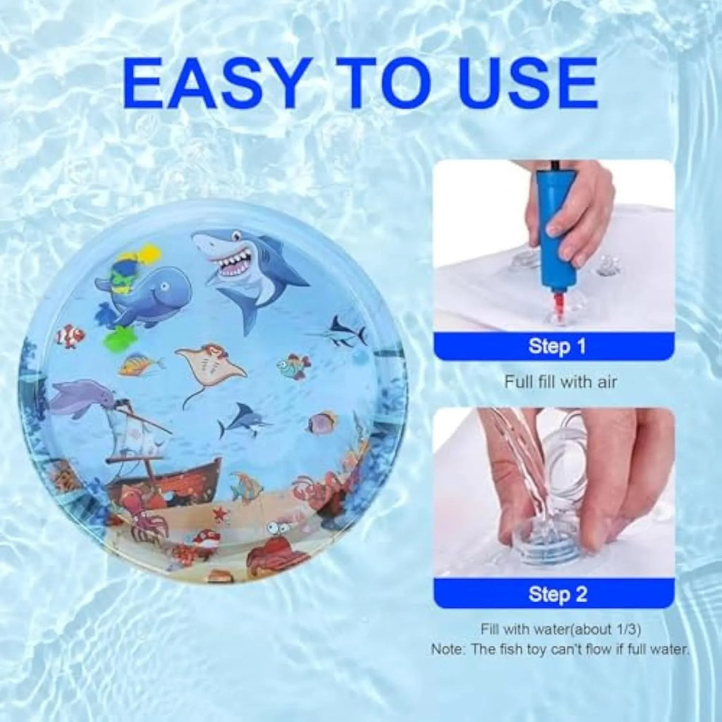 Blue circular cat water playmat on floor, showing ocean fish design and floating fish toys inside.