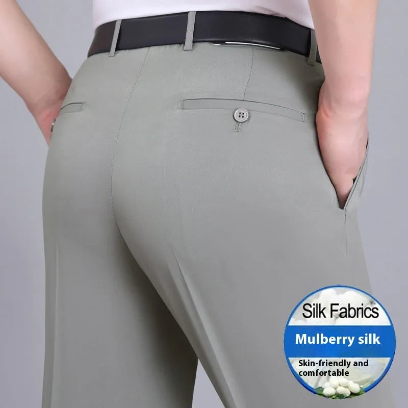 Men's straight-cut business trousers in dark blue with high waist and non-ironing construction