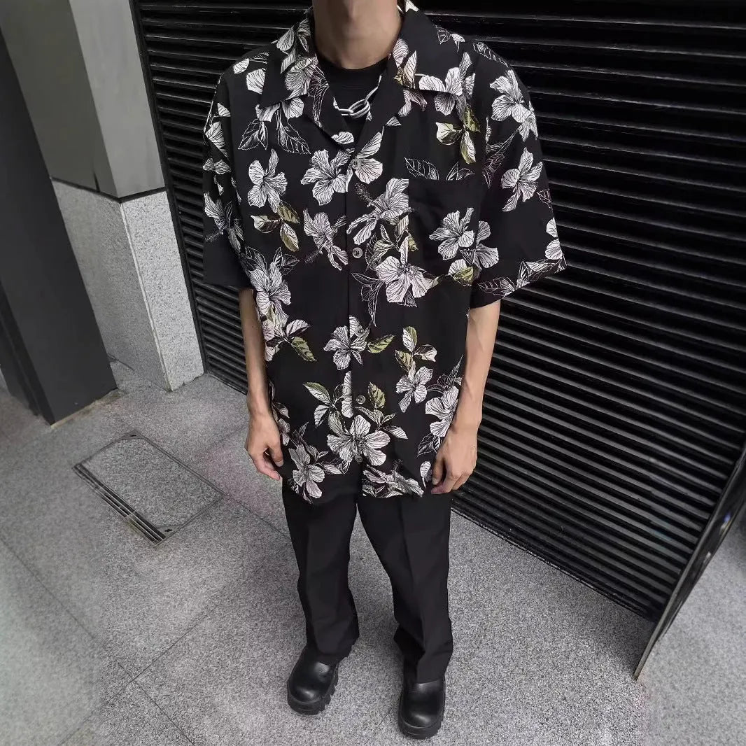 Black men's vintage Cuban collar shirt with printed floral pattern, made from thin ice silk fabric.