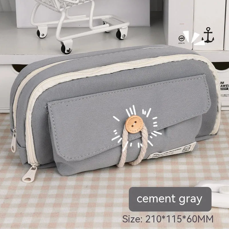 Green canvas button pencil case showing large capacity for pens in Korean style design.