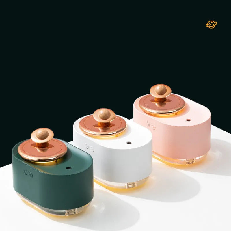 Rotating planet humidifier with night light in green, pink, or white colours showing USB port and mist output