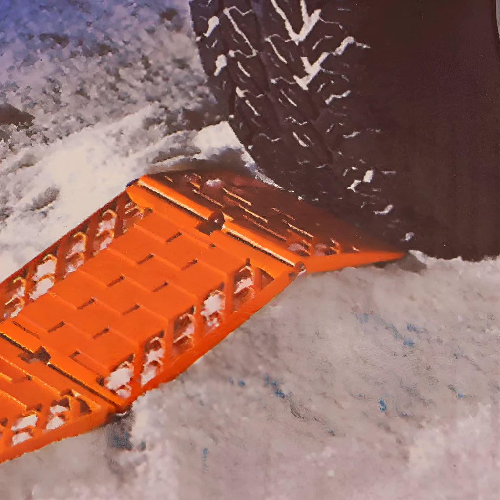 Orange folding vehicle rescue board showing rubber grip surface and folded size