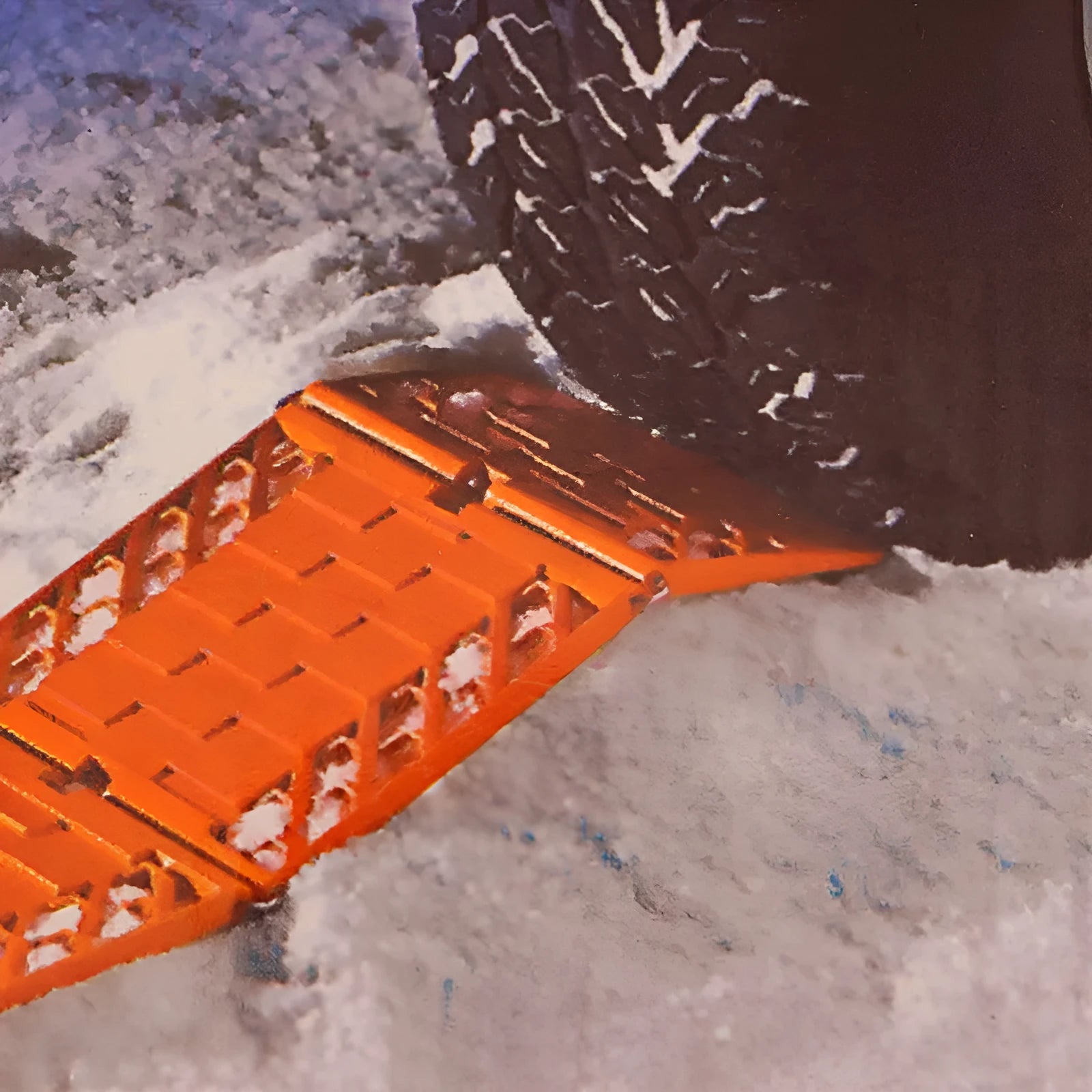 Orange folding vehicle rescue board showing rubber grip surface and folded size