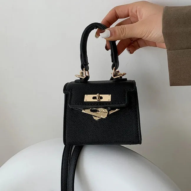 Mini one shoulder crossbody handbag, PU small square bag with lock closure, solid colour, front view