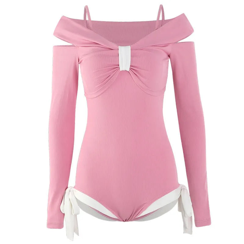 Women's long-sleeve one-piece swimsuit in black or pink polyester fabric