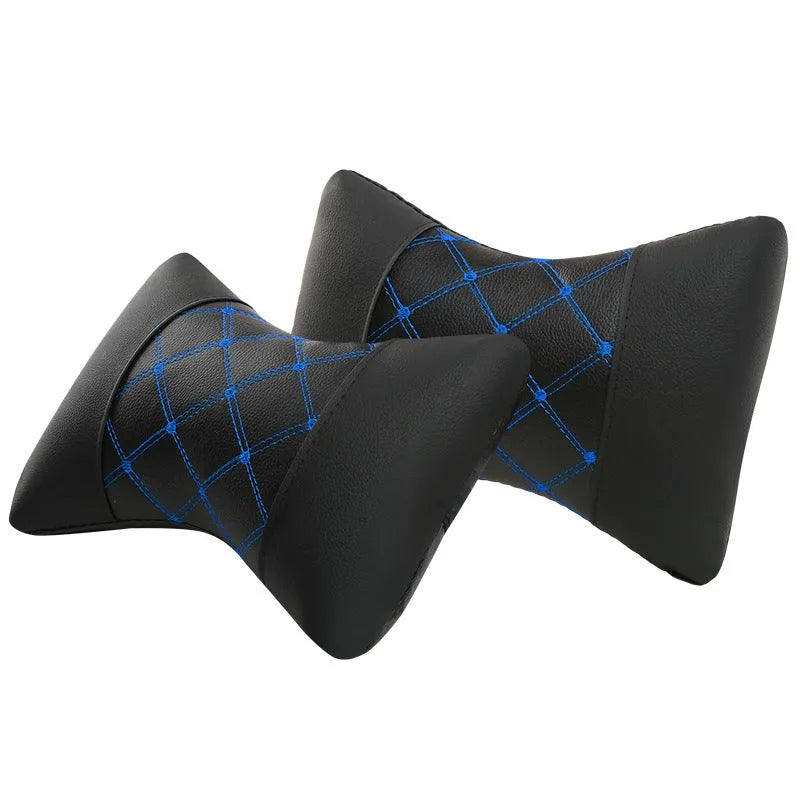 Black quilted diamond pattern car headrest pillow for cervical neck support.