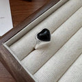 Open mouth adjustable sterling silver ring with black agate electroplated finish and heart design