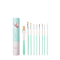 Set of acrylic gouache painting brushes including fan brushes, wide brush and detail brushes in animal-themed designs
