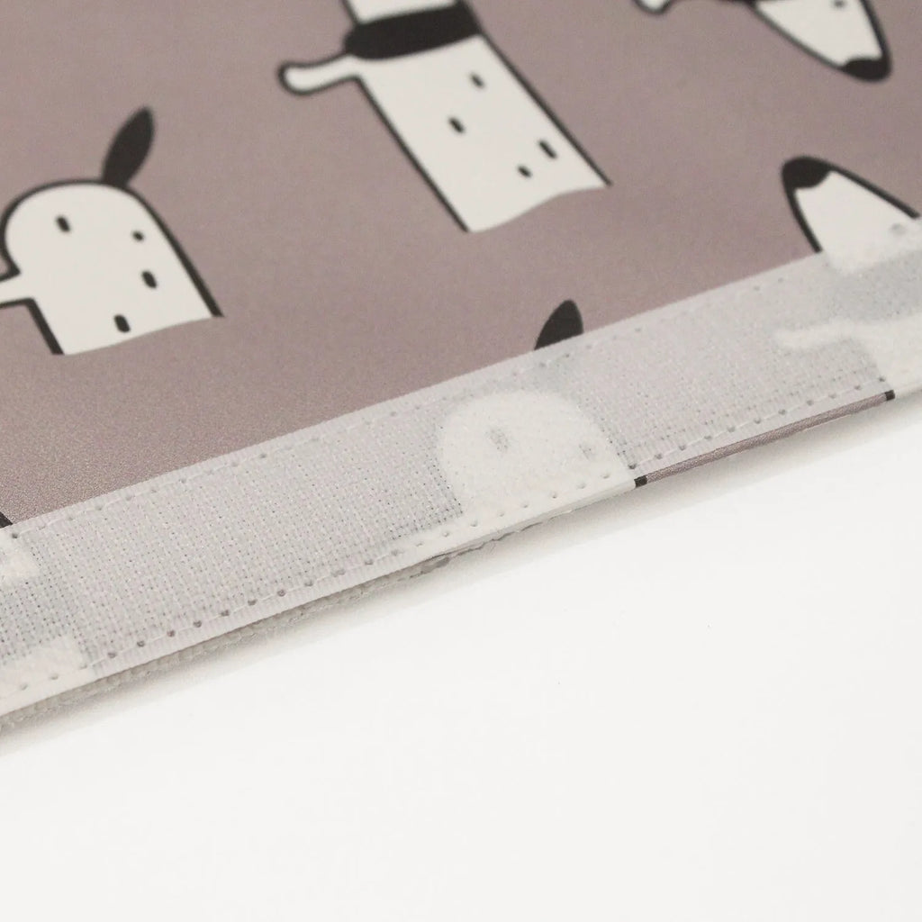 Cute Dachshund cartoon design on a black PU leather car seat belt shoulder protector sleeve.