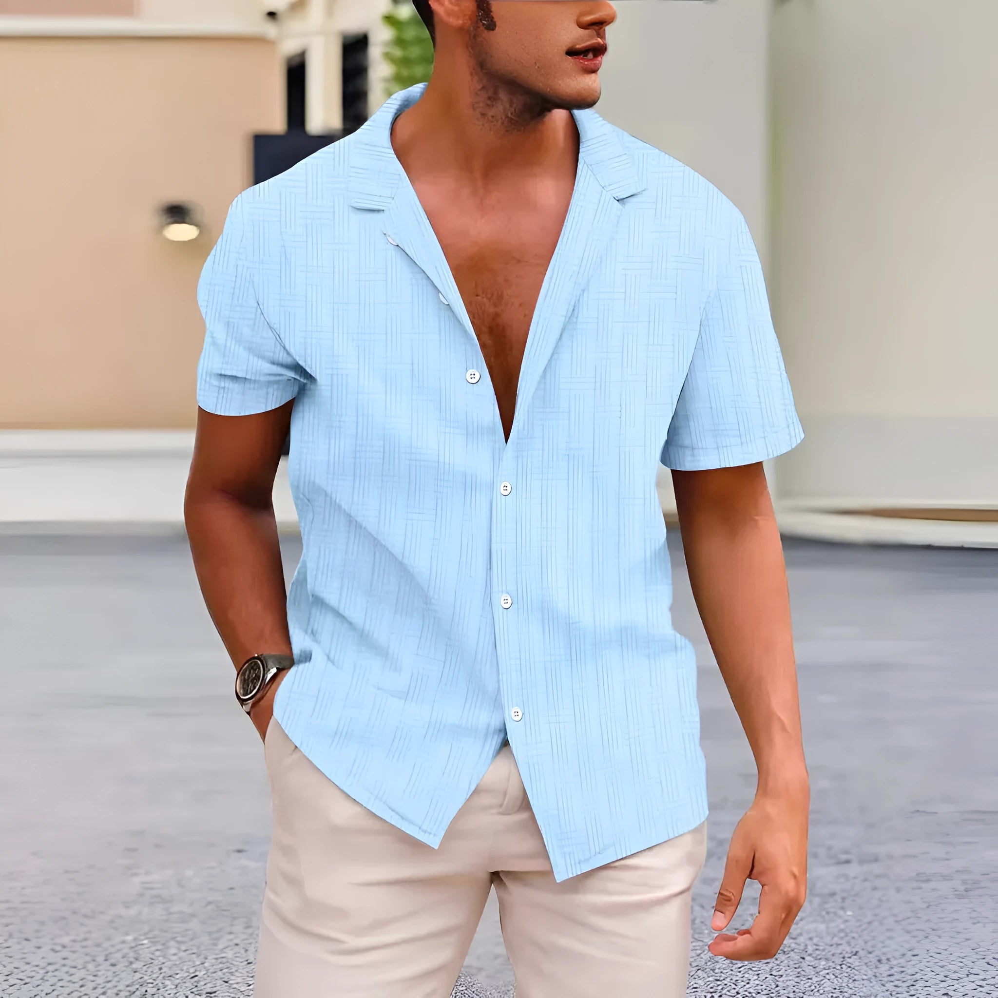 Men's apricot corduroy short sleeve button-up shirt with a British cardigan style on a hanger.