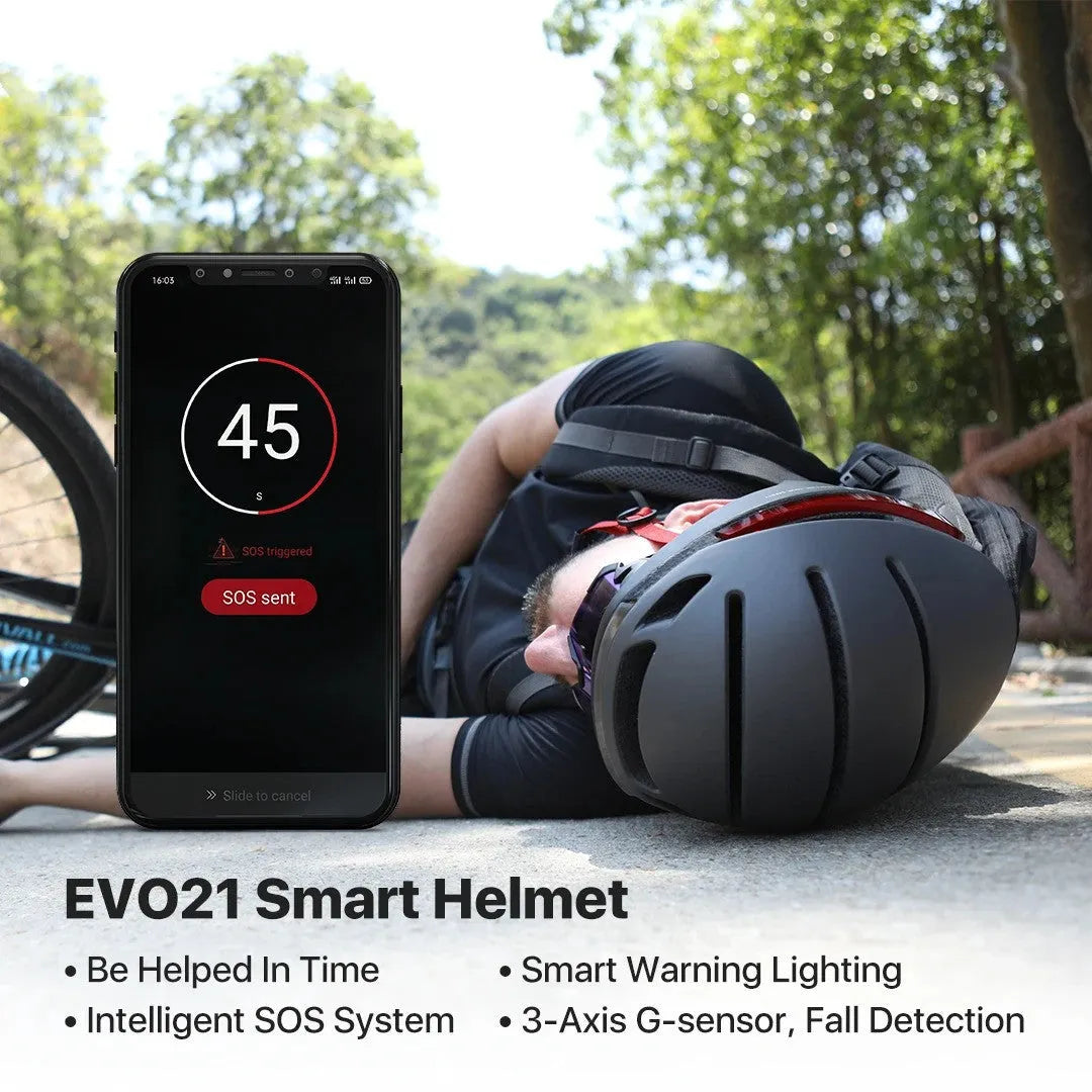 Matte black smart bicycle helmet with integrated LED lights on front and sides for night riding safety.