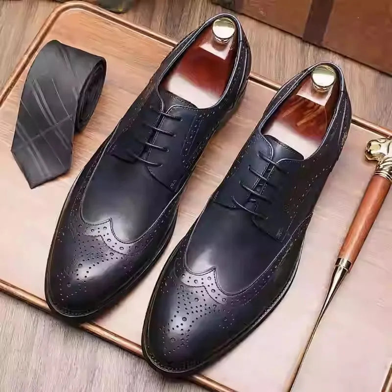 Men's black pointed toe Oxford leather shoes with carved brogue patterns and low heel