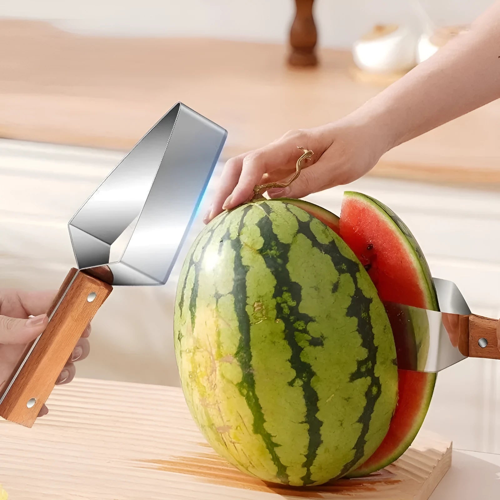Stainless steel triangle watermelon splitter knife with protective cover.