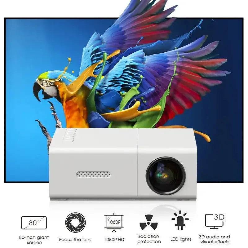 White or black M100 mini portable home projector with remote control on a table.