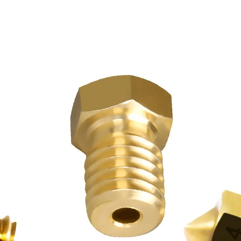 Brass 3D printer nozzle with M6 thread, shown next to a ruler for scale displaying 12.5mm length.
