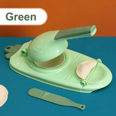 Orange and white manual dumpling skin press tool with ergonomic handle and hanging hole