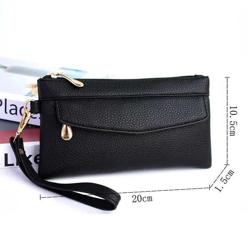Soft PU leather crossbody bag in a square shape showing the internal sandwich zipper pocket.