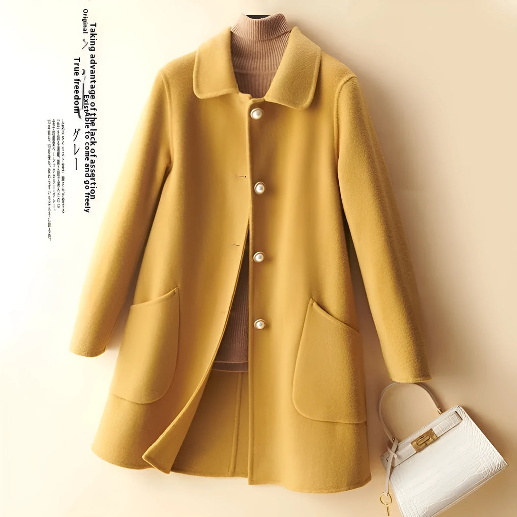 Women's solid colour wool coat with a doll collar and pearl buckle, shown in a mid-length cut.