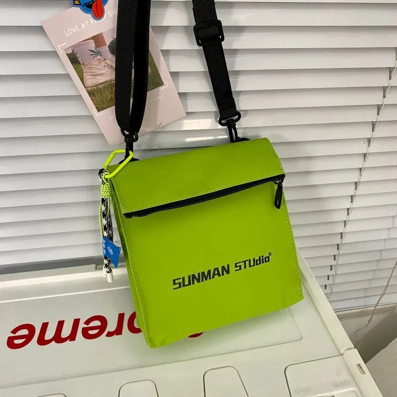 Messenger design backpack in polyester with crossbody strap and sewing line detailing